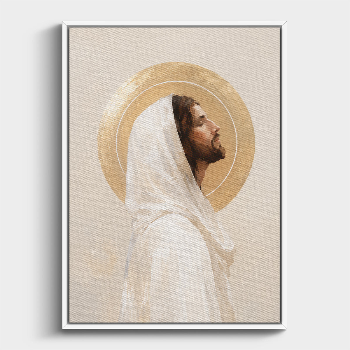 A framed religious art print depicting Jesus Christ in profile with a white veil and a gold halo, shown against a light gray background.