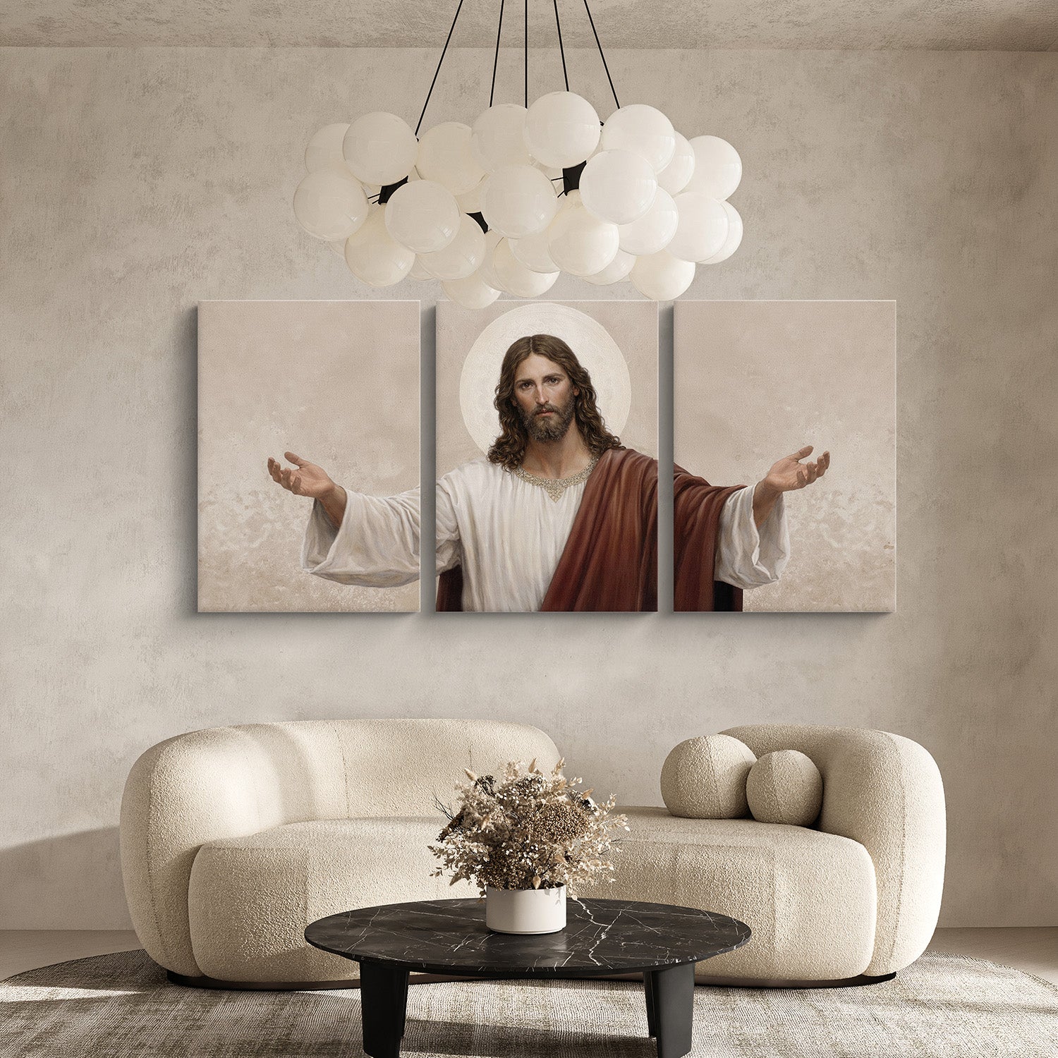 Triptych painting of a religious figure in a living room setting with a modern sofa and decorative table.
