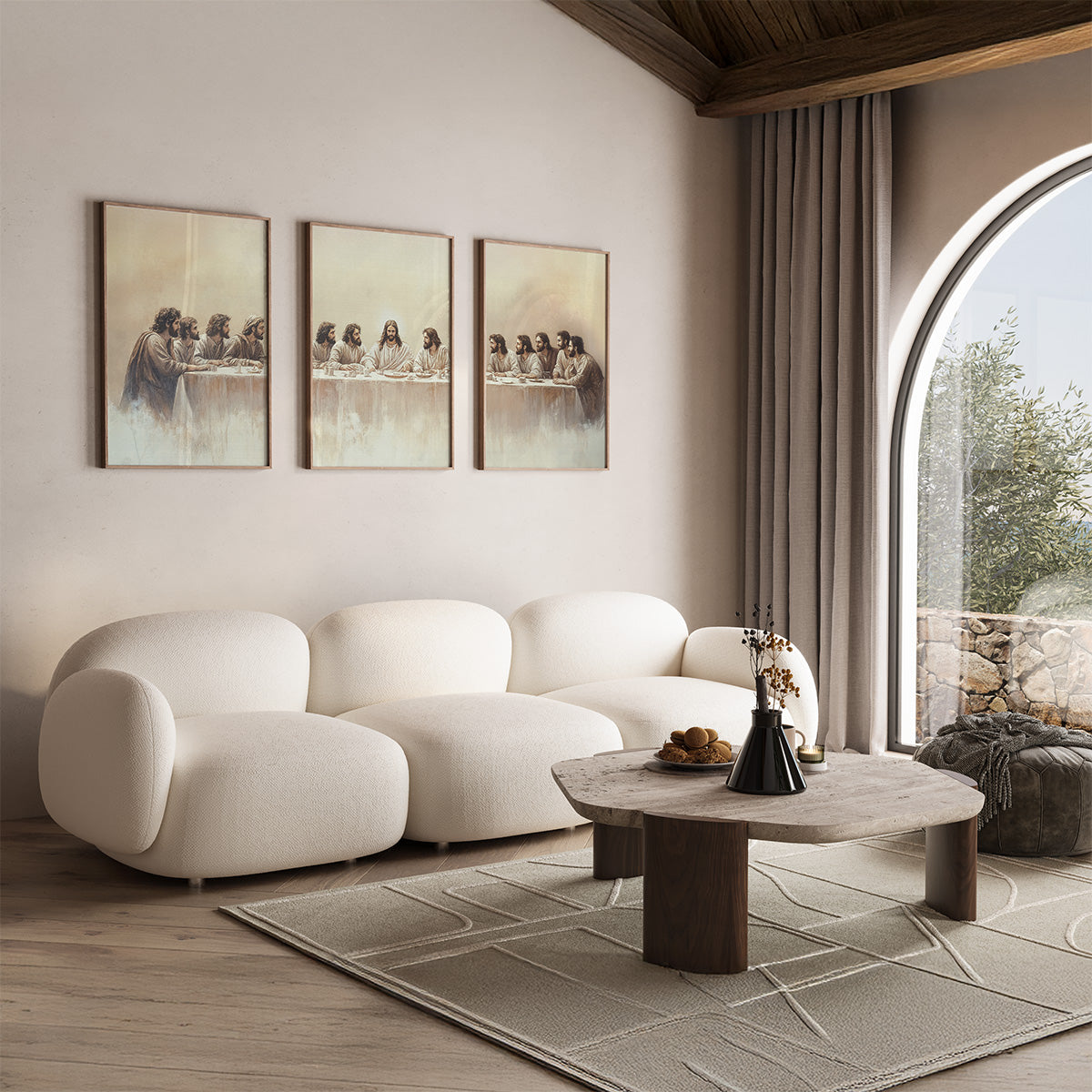 Modern living room with a white sofa, wooden coffee table, and framed artwork on the wall.