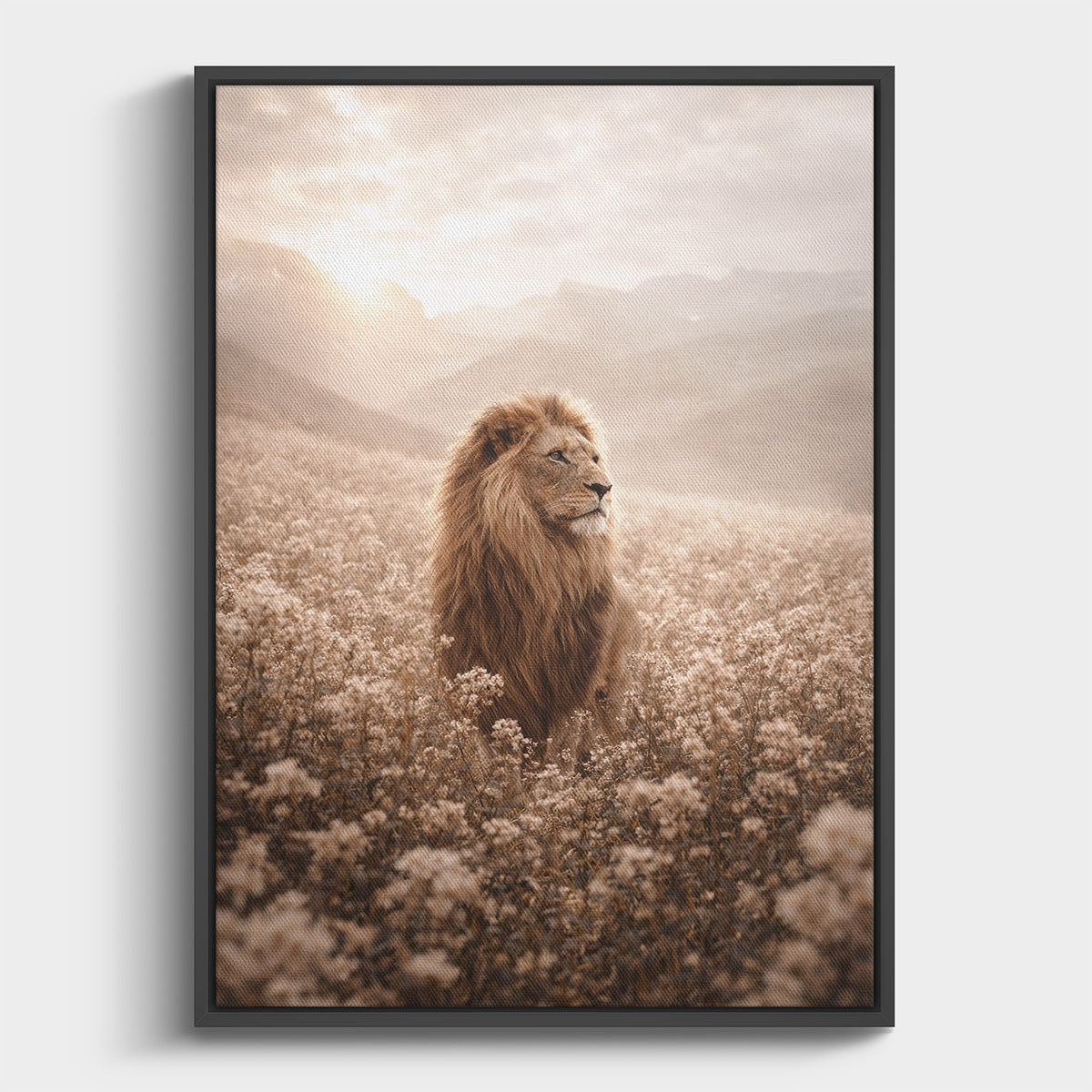 Framed artwork of a lion standing in a field with a misty background