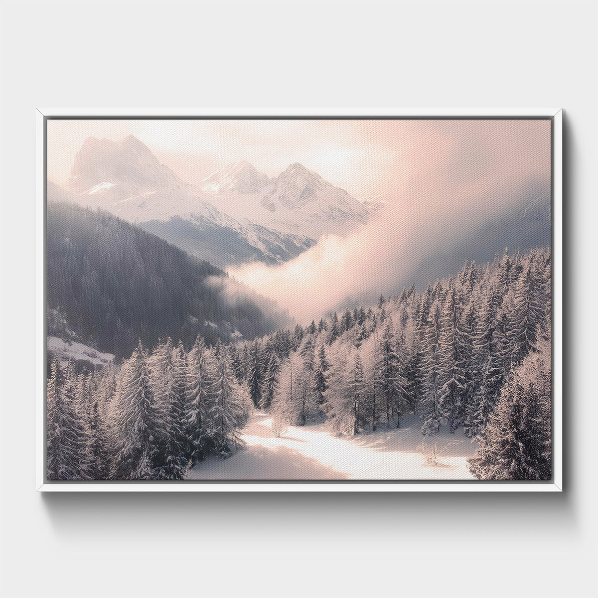 Framed photograph of a snowy mountain landscape with trees.